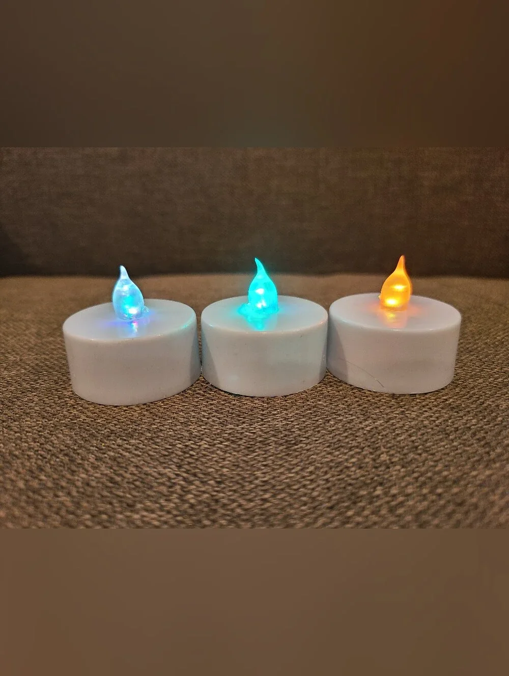 3 color-changing tea light candles